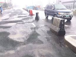 PWD asphalts road during heavy rains