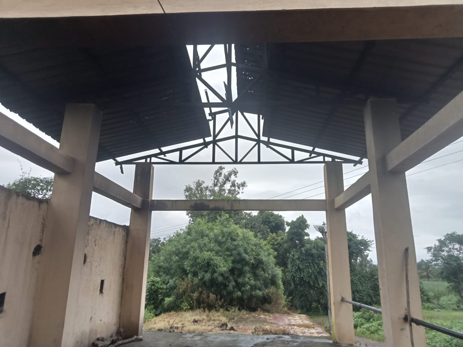 Dilapidated state of the cremation shed at Shendur