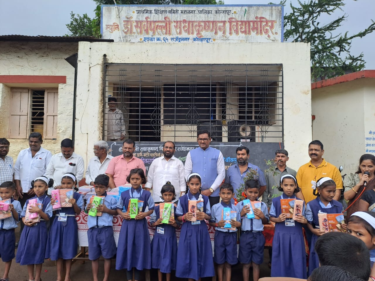 Educational material distribution activity to needy students appreciated Principal Dr Mahadev Narake