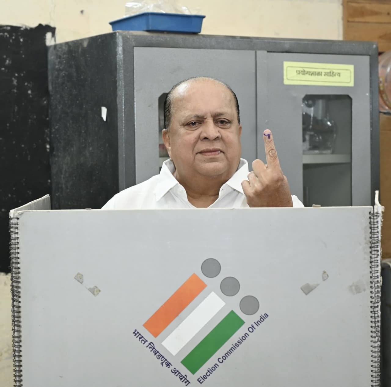 Minister Hasan Mushrif casts his vote for the Pune