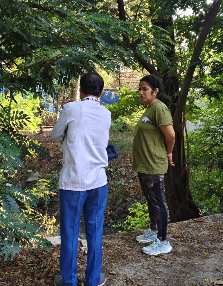 Administrator K Manjulaxmi inspects the cleaning of drains in the city