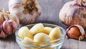 Eat two cloves of garlic every day on an empty stomach