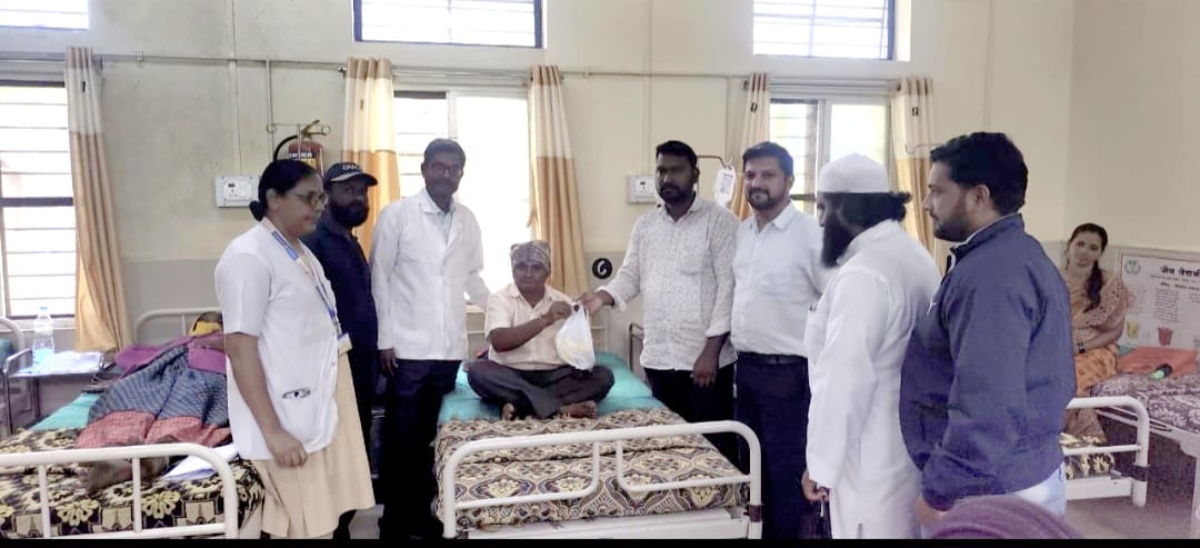 Distribution of fruits to patients on the occasion of Eid e Milad in Ajra